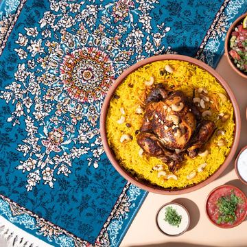 نصف دجاجة تنور مع رز بخاري
